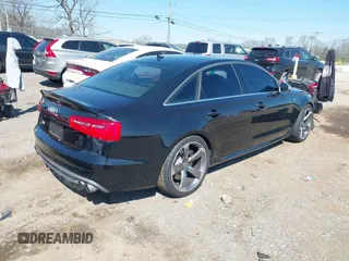2013 Audi S6 Prestige with VIN WAUJ2AFC0DN096028, listed as a IAAI auction lot 41817347 with 132,992 mi miles. Bid and sale history available at carsss.com. Image 4.