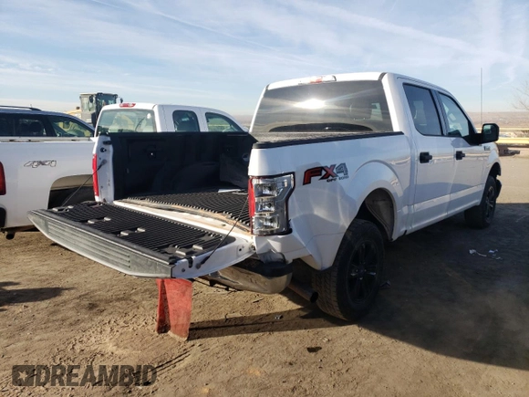 2019 Ford F-150 XL with VIN 1FTEW1E51KKE18332, listed as a Copart auction lot 86268344 with 141,566 mi miles and Salvage Title. Bid and sale history available at carsss.com. Image 3.
