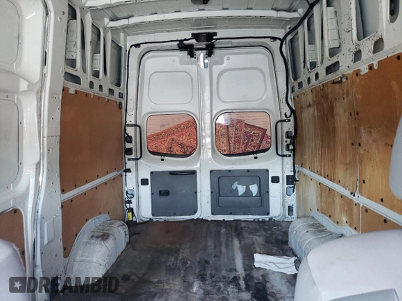 2016 Nissan NV Cargo SV z VIN 1N6BF0LY2GN806554, wystawiony jako Copart lot #68415294 z przebiegiem 93 384 mil mil oraz Szkoda całkowita • Salvage title. Historia ofert i sprzedaży dostępna na DreamBid. Obrazek 10.