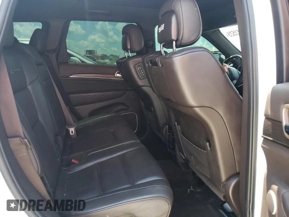 2015 Jeep Grand Cherokee Summit с VIN 1C4RJFJM0FC128965, выставлен на аукционе Copart как лот 63041525 с пробегом 179 500 миль миль и Чистый • Clean title. История ставок и продаж доступна на DreamBid. Изображение 11.
