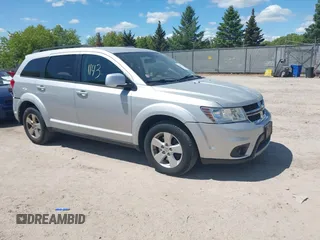 2012 Dodge Journey SXT z VIN 3C4PDCBGXCT390031, wystawiony jako IAAI lot #42281143 z przebiegiem 130 213 mil mil oraz . Historia ofert i sprzedaży dostępna na DreamBid. Obrazek 1.