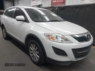 2012 Mazda CX-9 Sport with VIN JM3TB2BV8C0358549, listed as a IAAI auction lot 42275571 with 127,411 mi miles and . Bid and sale history available at DreamBid. Image 1.