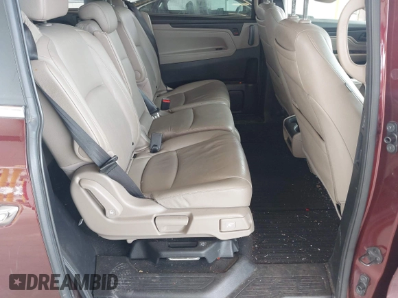 2019 Honda Odyssey Touring z VIN 5FNRL6H88KB030847, wystawiony jako IAAI lot #42433312 z przebiegiem Nie podano mil oraz . Historia ofert i sprzedaży dostępna na DreamBid. Obrazek 8.