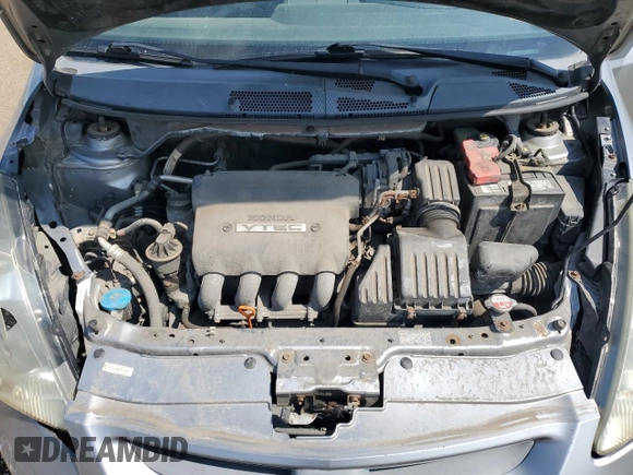 2007 Honda Fit Sport with VIN JHMGD38687S067648, listed as a Copart auction lot 64657345 with 123,055 mi miles and Salvage title. Bid and sale history available at DreamBid. Image 11.