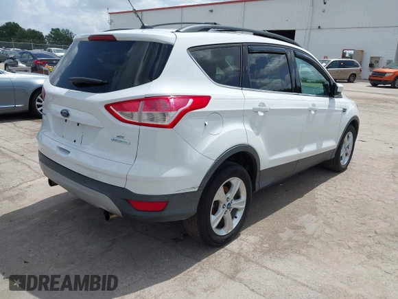 2013 Ford Escape SE with VIN 1FMCU0GX5DUA85464, listed as a IAAI auction lot 42452112 with 158,081 mi miles and . Bid and sale history available at DreamBid. Image 4.