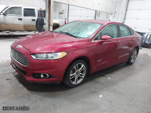 2016 Ford Fusion Energi Titanium with VIN 3FA6P0SU5GR357759, listed as a IAAI auction lot 41458338 with 103,610 mi miles. Bid and sale history available at carsss.com. Image 17.