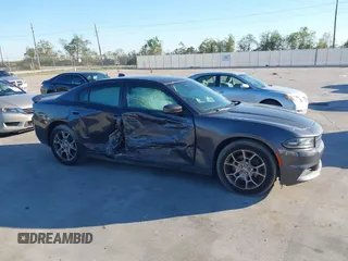 2015 Dodge Charger SXT z VIN 2C3CDXJG1FH746276, wystawiony jako IAAI lot #40925452 z przebiegiem 121 070 mil mil oraz . Historia ofert i sprzedaży dostępna na DreamBid. Obrazek 13.