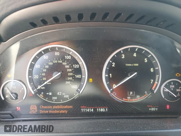 2014 BMW X5 xDrive35i with VIN 5UXKR0C52E0H20513, listed as a Copart auction lot 52831615 with 111,414 mi miles and Salvage Title. Bid and sale history available at carsss.com. Image 9.