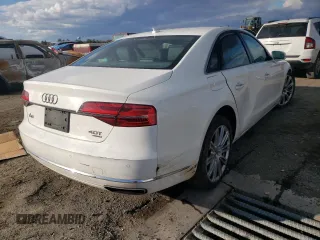 2015 Audi A8 4.0T with VIN WAUJ2AFD3FN005524, listed as a Copart auction lot 65610982 with 105,627 mi miles and . Bid and sale history available at DreamBid. Image 4.