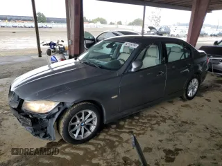 2010 BMW 3 Series 328i with VIN WBAPH5C5XAA439808, listed as a Copart auction lot 82169294 with 124,780 mi miles and Salvage title. Bid and sale history available at DreamBid. Image 1.