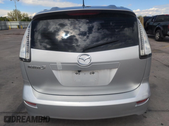 2009 Mazda 5 Grand Touring with VIN JM1CR293390335231, listed as a Copart auction lot 55560285 with 96,502 mi miles and Salvage title. Bid and sale history available at DreamBid. Image 6.