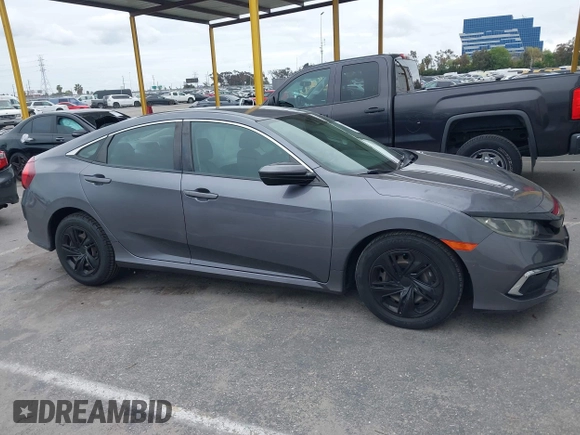 2020 Honda Civic LX with VIN 2HGFC2F63LH530442, listed as a IAAI auction lot 42071650 with 38,520 mi miles and . Bid and sale history available at DreamBid. Image 13.