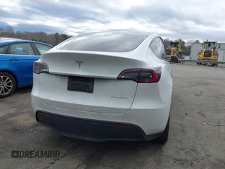 2023 Tesla Model Y Long Range z VIN 7SAYGDEE4PF621640, wystawiony jako IAAI lot #41796502 z przebiegiem 68 484 mil mil oraz . Historia ofert i sprzedaży dostępna na DreamBid. Obrazek 17.