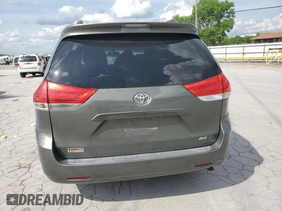 2014 Toyota Sienna XLE with VIN 5TDYK3DC2ES439353, listed as a Copart auction lot 54332275 with 130,312 mi miles and Salvage Title. Bid and sale history available at DreamBid. Image 6.