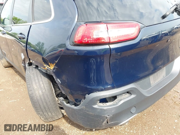 2015 Jeep Cherokee Limited with VIN 1C4PJLDBXFW658441, listed as a IAAI auction lot 42167135 with Not Provided miles and . Bid and sale history available at DreamBid. Image 6.