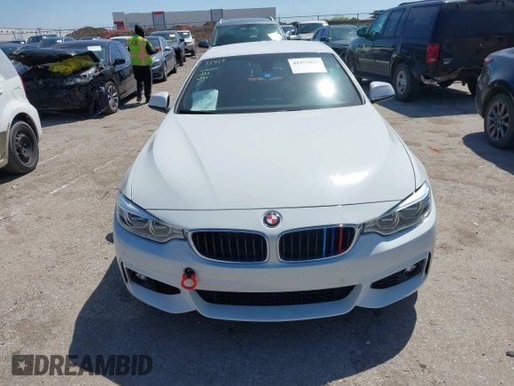 2015 BMW 4 Series 428i z VIN WBA3V7C52FP771779, wystawiony jako IAAI lot #41953647 z przebiegiem 66 003 mil mil oraz . Historia ofert i sprzedaży dostępna na DreamBid. Obrazek 12.