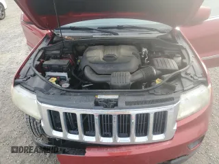 2011 Jeep Grand Cherokee Laredo with VIN 1J4RS4GG6BC704212, listed as a Copart auction lot 83753234 with 200,104 mi miles and Salvage Title. Bid and sale history available at DreamBid. Image 12.