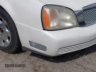 2000 Cadillac DeVille z VIN 1G6KD54Y2YU319515, wystawiony jako IAAI lot #41638065 z przebiegiem Nie podano mil oraz . Historia ofert i sprzedaży dostępna na DreamBid. Obrazek 6.