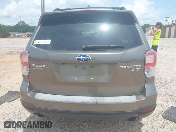 2017 Subaru Forester Touring with VIN JF2SJGWCXHH558789, listed as a IAAI auction lot 42518698 with 112,294 mi miles and . Bid and sale history available at DreamBid. Image 16.