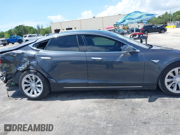 2016 Tesla Model S 70 with VIN 5YJSA1E16GF156312, listed as a IAAI auction lot 42469451 with 90,317 mi miles and . Bid and sale history available at DreamBid. Image 14.