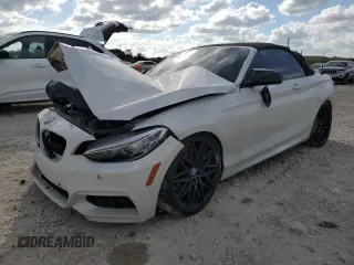 2016 BMW 2 Series M235i with VIN WBA1M1C52GV394696, listed as a Copart auction lot 43650665 with 0 mi miles and Salvage Title. Bid and sale history available at carsss.com. Image 1.
