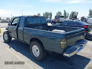 1995 Toyota Tacoma with VIN 4TAUN53B5SZ082797, listed as a IAAI auction lot 42660124 with 181,066 mi miles and . Bid and sale history available at DreamBid. Image 3.