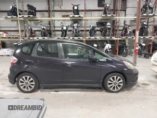 2013 Honda Fit Sport z VIN JHMGE8H56DC019556, wystawiony jako IAAI lot #41140755 z przebiegiem Nie podano mil oraz . Historia ofert i sprzedaży dostępna na DreamBid. Obrazek 12.