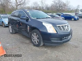 2014 Cadillac SRX with VIN 3GYFNAE38ES659362, listed as a IAAI auction lot 41971537 with 115,379 mi miles and . Bid and sale history available at DreamBid. Image 1.