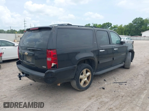 2011 Chevrolet Suburban LT with VIN 1GNSCJE07BR128885, listed as a IAAI auction lot 42456748 with 201,789 mi miles and . Bid and sale history available at DreamBid. Image 4.
