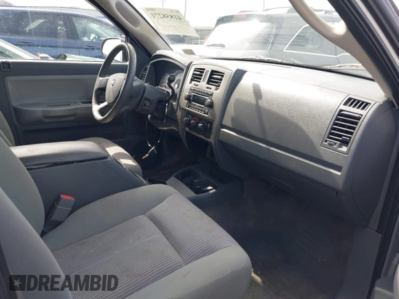 2007 Dodge Dakota SLT with VIN 1D7HE48K57S147503, listed as a IAAI auction lot 41858271 with 242,534 mi miles and . Bid and sale history available at DreamBid. Image 5.
