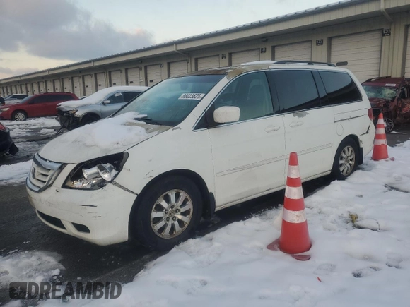 2010 Honda Odyssey EX-L with VIN 5FNRL3H77AB051869, listed as a Copart auction lot 88023625 with 248,511 mi miles and Salvage Title. Bid and sale history available at DreamBid. Image 1.