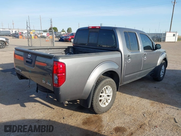 2021 Nissan Frontier SV with VIN 1N6ED0EB2MN702654, listed as a IAAI auction lot 42227414 with 142,309 mi miles and . Bid and sale history available at DreamBid. Image 4.