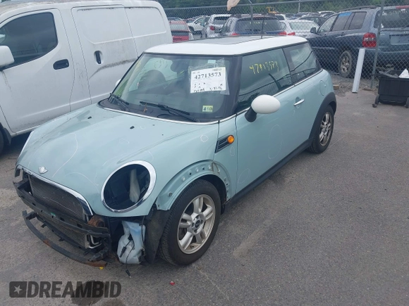 2012 MINI Hardtop with VIN WMWSU3C53CT186381, listed as a IAAI auction lot 42713573 with 134,408 mi miles and . Bid and sale history available at DreamBid. Image 2.