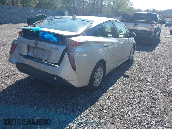 2018 Toyota Prius Two with VIN JTDKARFU5J3057086, listed as a IAAI auction lot 41910758 with 178,279 mi miles and . Bid and sale history available at DreamBid. Image 4.