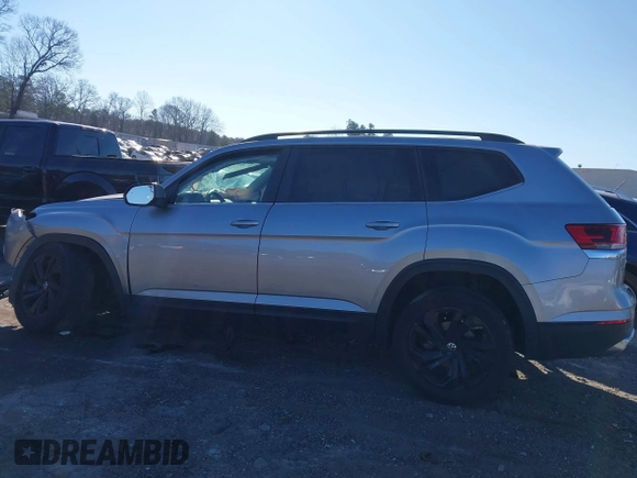 2022 Volkswagen Atlas SE z VIN 1V2JP2CA6NC502757, wystawiony jako IAAI lot #41247026 z przebiegiem 70 124 mil mil oraz . Historia ofert i sprzedaży dostępna na DreamBid. Obrazek 14.