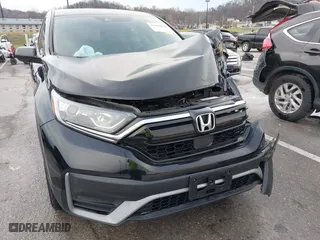 2020 Honda CR-V LX with VIN 2HKRW2H2XLH671349, listed as a IAAI auction lot 41204020 with 71,374 mi miles. Bid and sale history available at carsss.com. Image 18.