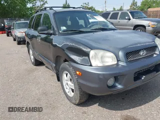 2003 Hyundai Santa Fe GLS z VIN KM8SC13D73U347225, wystawiony jako IAAI lot #42368665 z przebiegiem 208 072 mil mil oraz . Historia ofert i sprzedaży dostępna na DreamBid. Obrazek 6.
