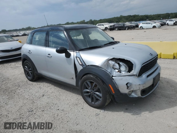 2014 MINI Countryman S with VIN WMWZC5C55EWM18087, listed as a Copart auction lot 68661614 with Not provided miles and Salvage title. Bid and sale history available at DreamBid. Image 4.