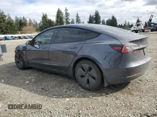 2021 Tesla Model 3 Standard Range Plus with VIN 5YJ3E1EA3MF017744, listed as a Copart auction lot 51513405 with 96,912 mi miles and Salvage Title. Bid and sale history available at carsss.com. Image 2.