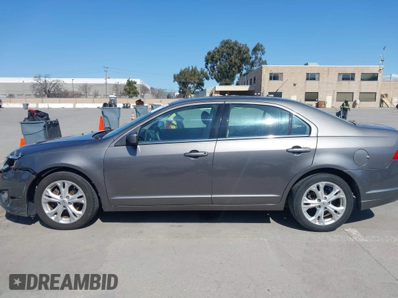 2012 Ford Fusion SE z VIN 3FAHP0HA8CR401382, wystawiony jako IAAI lot #41739680 z przebiegiem 73 404 mil mil oraz . Historia ofert i sprzedaży dostępna na DreamBid. Obrazek 14.