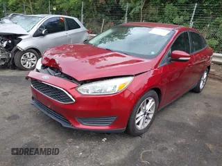 2015 Ford Focus SE with VIN 1FADP3F22FL259223, listed as a IAAI auction lot 42333439 with 77,111 mi miles and . Bid and sale history available at DreamBid. Image 2.