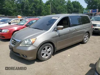 2008 Honda Odyssey Touring z VIN 5FNRL38968B025520, wystawiony jako Copart lot #60799645 z przebiegiem 116 592 mil mil oraz Szkoda całkowita • Salvage title. Historia ofert i sprzedaży dostępna na DreamBid. Obrazek 1.