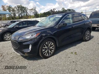 2021 Ford Escape Titanium Hybrid z VIN 1FMCU0DZ1MUB16182, wystawiony jako Copart lot #74047504 z przebiegiem 48 933 mil mil oraz Szkody całkowita. Historia ofert i sprzedaży dostępna na DreamBid. Obrazek 1.