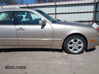 2002 Mercedes-Benz E-Class with VIN WDBJF65J42B394017, listed as a IAAI auction lot 41706917 with 188,883 mi miles. Bid and sale history available at carsss.com. Image 20.