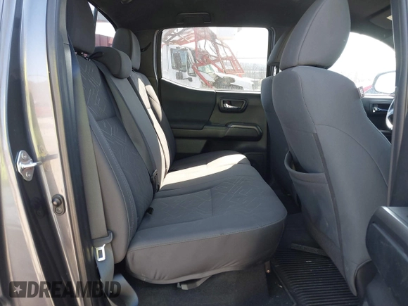 2018 Toyota Tacoma SR with VIN 5TFCZ5AN9JX123749, listed as a IAAI auction lot 41768884 with 42,852 mi miles and . Bid and sale history available at DreamBid. Image 8.