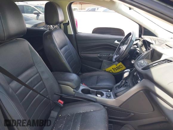 2014 Ford Escape SE z VIN 1FMCU0G96EUD57930, wystawiony jako IAAI lot #42347567 z przebiegiem 169 128 mil mil oraz . Historia ofert i sprzedaży dostępna na DreamBid. Obrazek 5.