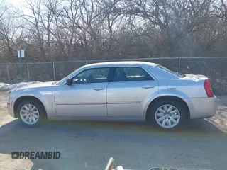 2008 Chrysler 300 LX with VIN 2C3KA43R48H251025, listed as a IAAI auction lot 41510553 with 104,103 mi miles. Bid and sale history available at carsss.com. Image 14.