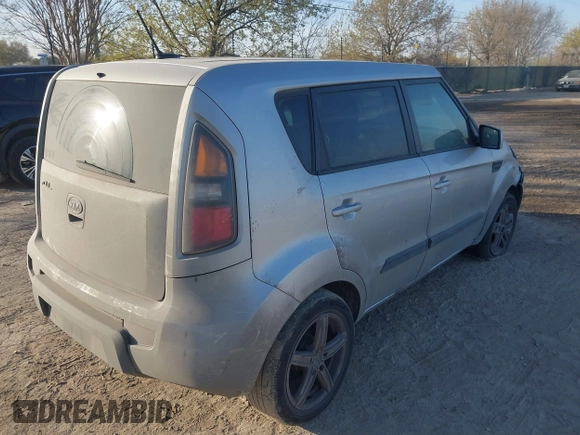 2011 Kia Soul + with VIN KNDJT2A28B7712001, listed as a IAAI auction lot 41767843 with 218,016 mi miles. Bid and sale history available at carsss.com. Image 4.