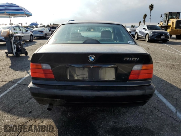 1997 BMW 3 Series 318i with VIN WBACC9327VEE58764, listed as a Copart auction lot 77671674 with 228,996 mi miles and Clean Title. Bid and sale history available at carsss.com. Image 6.