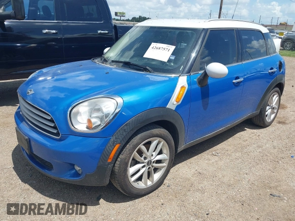 2014 MINI Countryman with VIN WMWZB3C52EWR40215, listed as a IAAI auction lot 42687571 with 106,338 mi miles and . Bid and sale history available at DreamBid. Image 2.